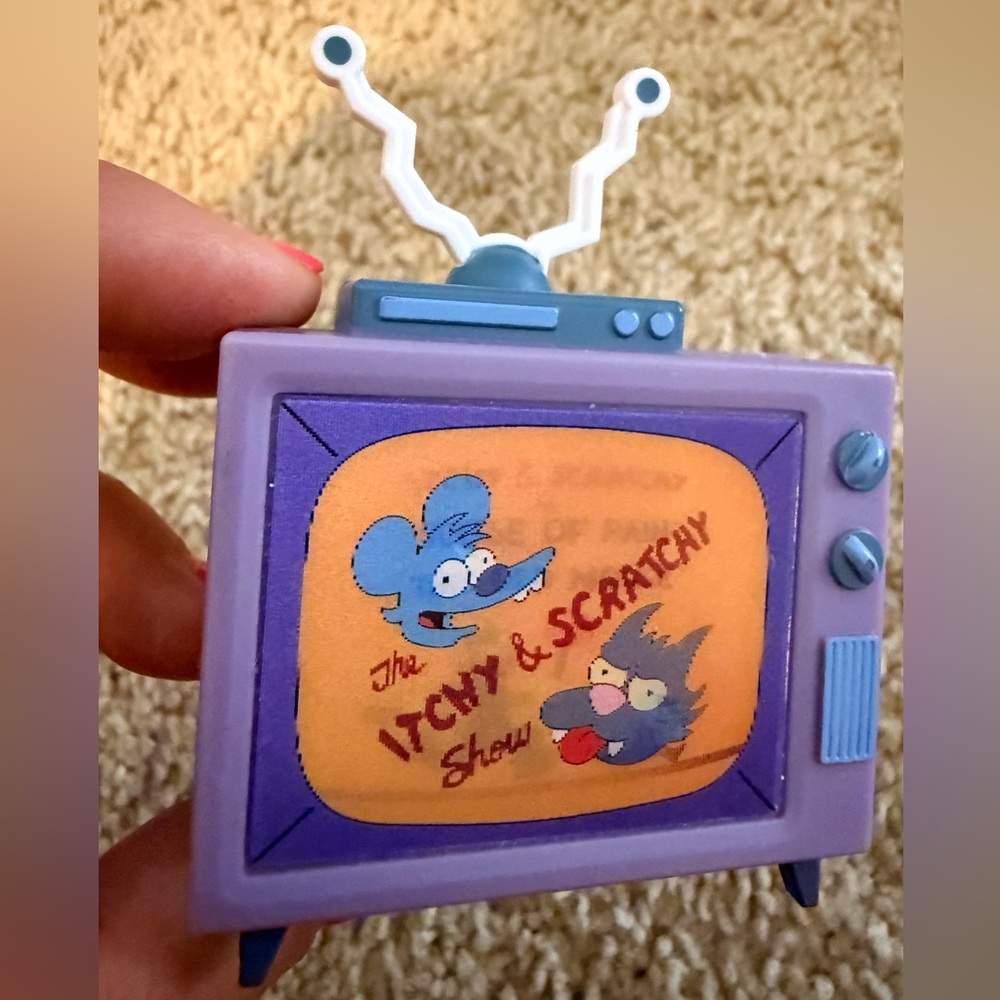 The Simpsons HomeKit replacement TV itchy and scratchy show